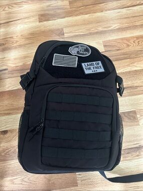 NWT Bass Pro Shops Black Tactical Sling Pack with Patch Panels